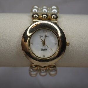 Women's Vanity Fair Gold Watch with White Pearl Bracelet